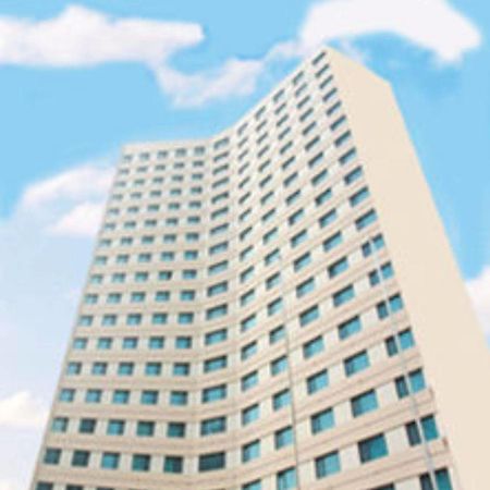 Overseas Chinese International Hotel Циндао Экстерьер фото