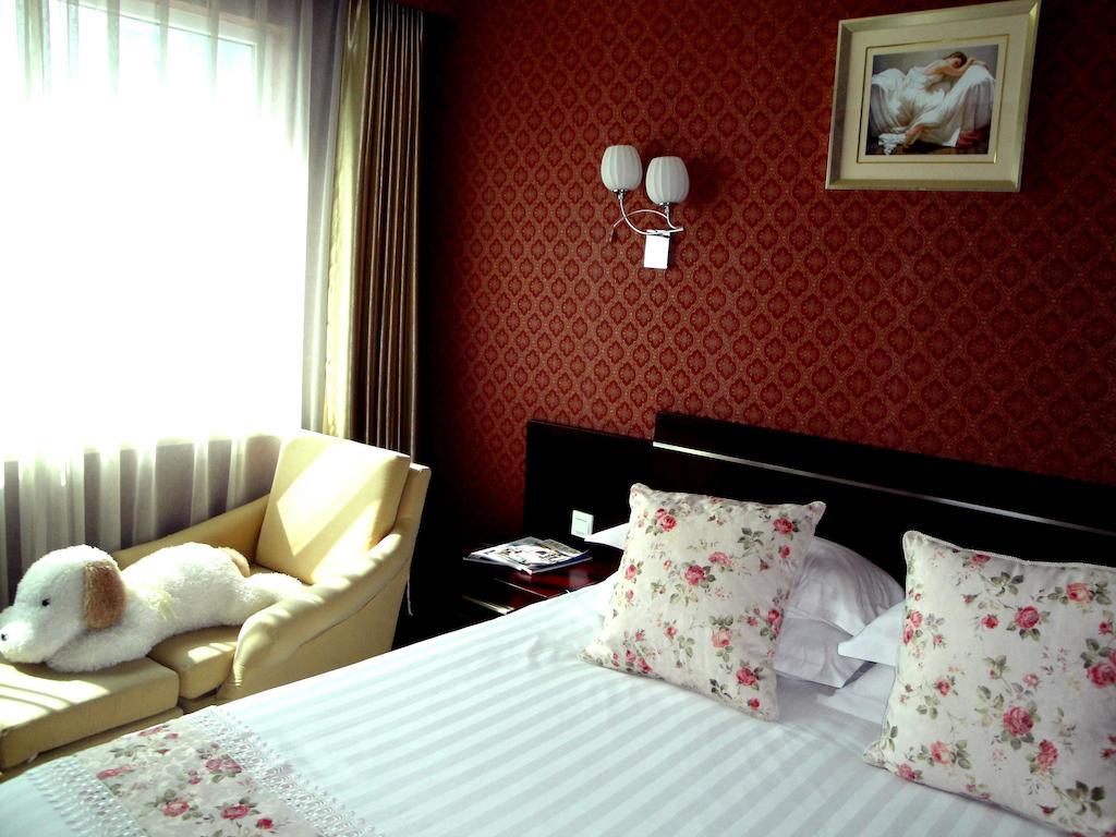 Overseas Chinese International Hotel Циндао Экстерьер фото