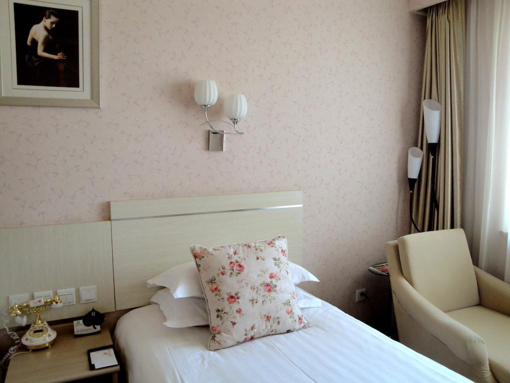 Overseas Chinese International Hotel Циндао Экстерьер фото