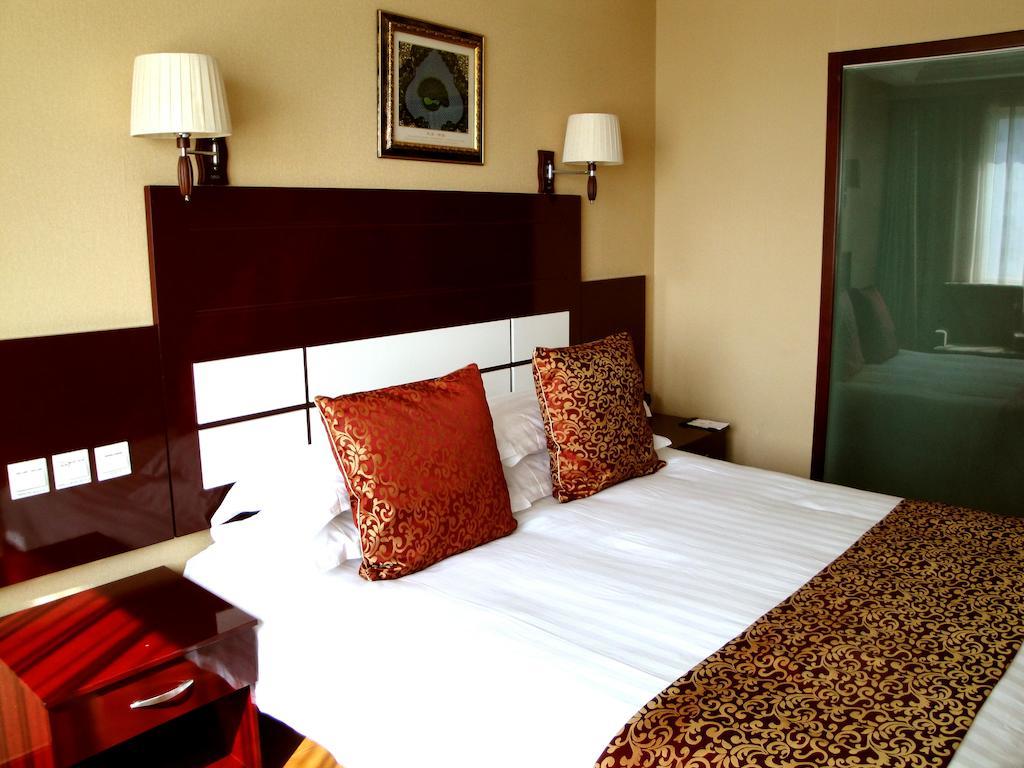Overseas Chinese International Hotel Циндао Экстерьер фото