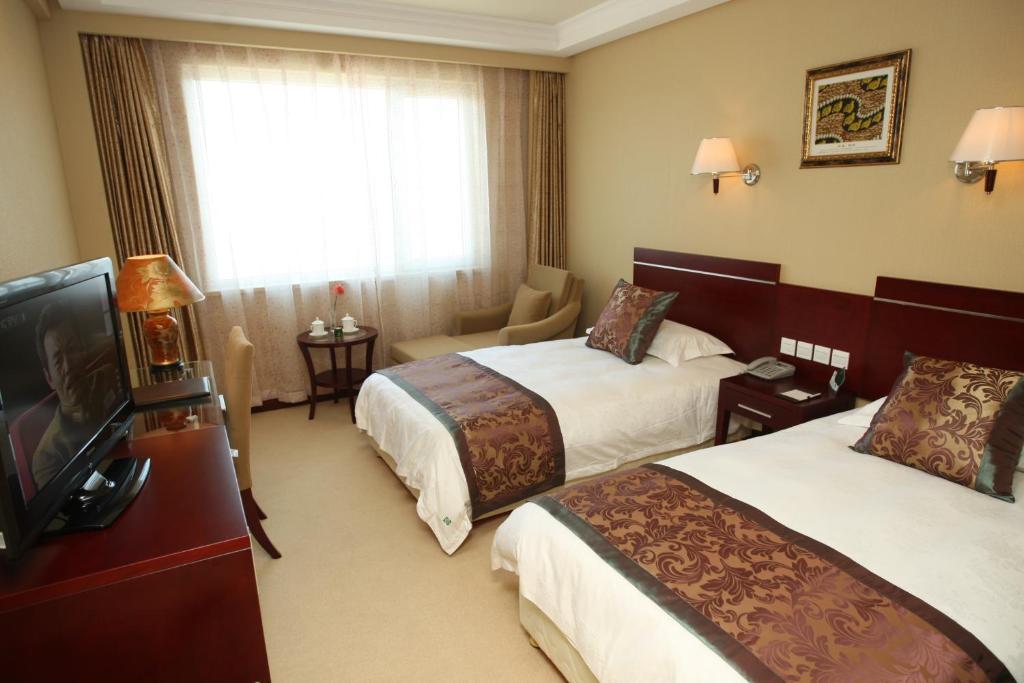 Overseas Chinese International Hotel Циндао Экстерьер фото