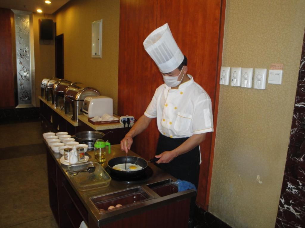 Overseas Chinese International Hotel Циндао Экстерьер фото