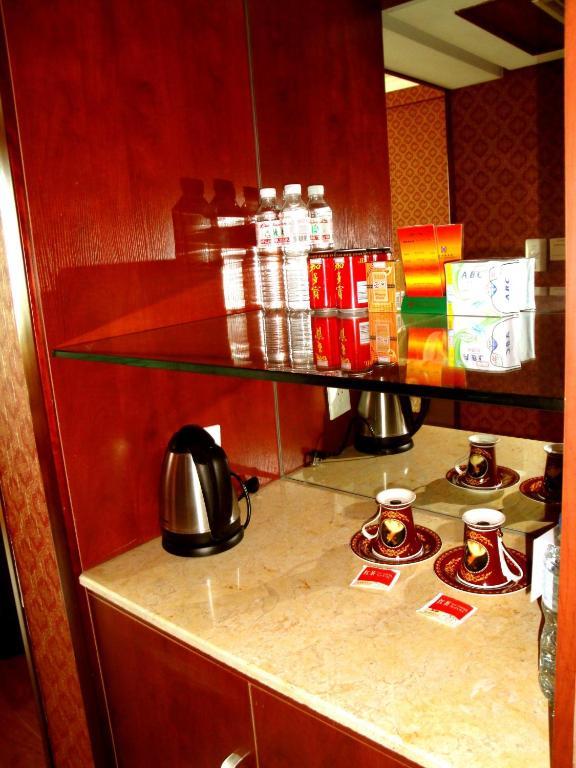 Overseas Chinese International Hotel Циндао Номер фото